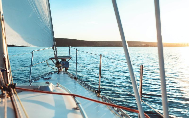 luxury-yacht-sailing-across-the-sea-on-sunny-summer-day-1.jpg